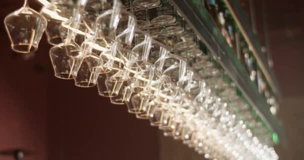 Handheld Low Angle Interior Design Shot Many Wine Glasses Placed — Stock Video
