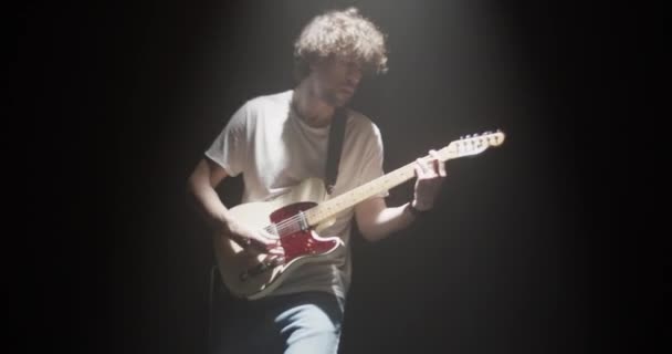 Real Time Handheld Shot Male Musician Curly Hair Playing Solo — Stock Video