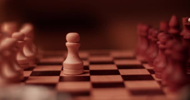 Real Time Handheld Shot Blurred Colored Chess Pieces Arranged Board — Stock Video