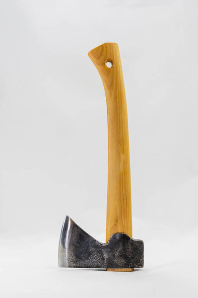 Traditional axe with wooden handle on white background. Carpenter's tool.