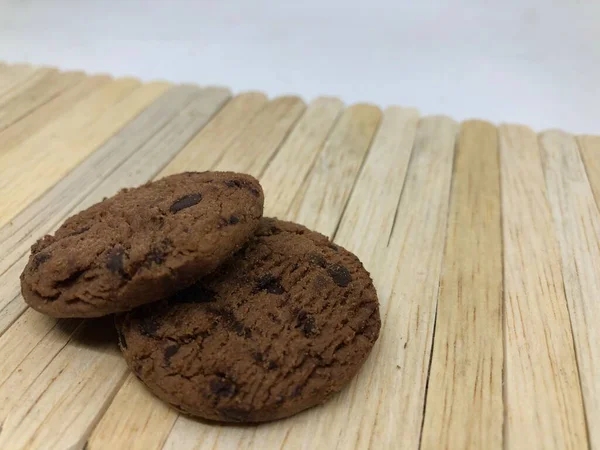 chocolate cookies with cream on a white background