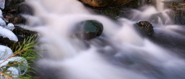 Softness of water in a rapid in winter