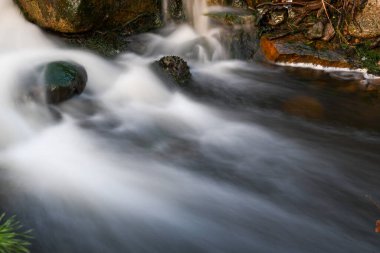 Softness of water in a rapid in winter