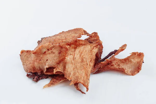 Close-up shot of a dry-aged man carefully slicing a tender dry-aged beef brisket to be served at a barbecue restaurant. on a white background. High quality photo