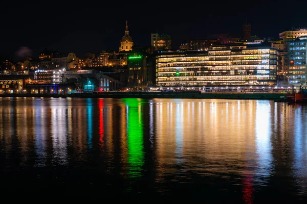 Stockholm, Sweden - December 23, 2022: Night view from Gamla Stan on Sdermalm Skeppsholmen