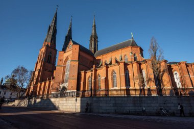 Uppsala, Sweden - January 26, 2023: Uppsala Cathedral (Uppsala domkyrka) on bright sunny winter day