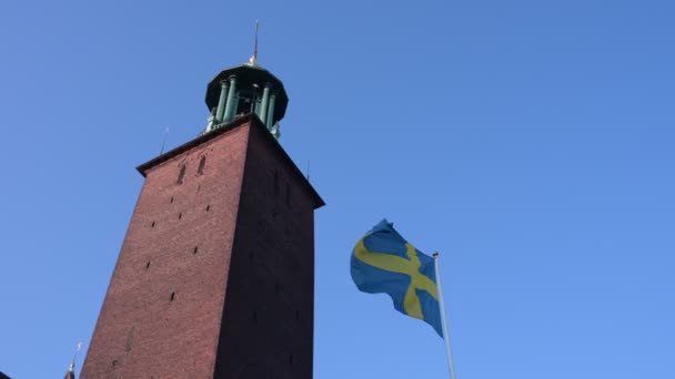 Stockholm Sweden June 2023 Stockholm City Hall Swedish Flag Waving — Stock Video
