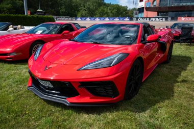 Stockholm, Sweden - August 03, 2024: Red Chevrolet Corvette (C8) Stingray front view