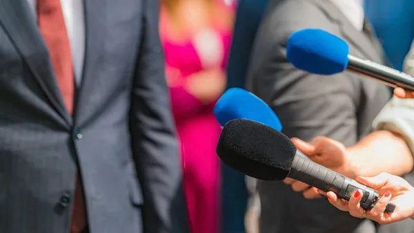 Journalists Holding Microphone Interviewing Politician — Stock Photo, Image