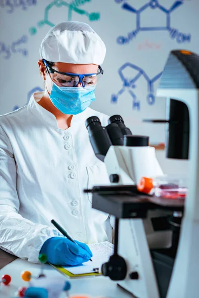 Biotechnology Scientist Taking Notes — Stock Photo, Image