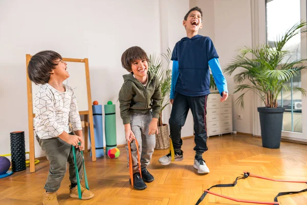 Children Exercising Resistance Bands Indoors — Stock Photo, Image