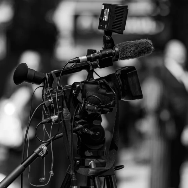 Television Camera at a Press Conference
