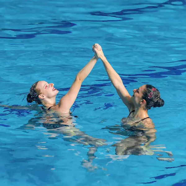 Fluid Grace Synchronized Beauty Female Duet Dancing Perfect Harmony Mesmerizing Stock Picture