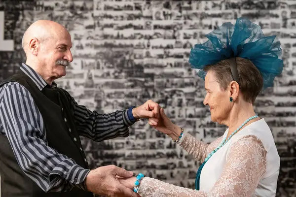 stock image Seniors showcase timeless elegance in a ballroom dance, celebrating life's rhythms with graceful movements and joyous harmony