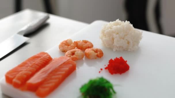 Chef Prepares Sushi Rolls Philadelphia Tuna Avocado Crab Cheese — Stock Video