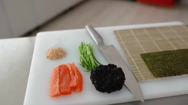 Chef Prepares Sushi Rolls Philadelphia Tuna Avocado Crab Cheese — Stock Video