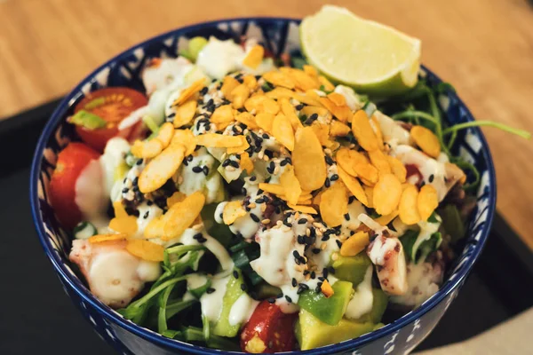 stock image Traditional Japanese healthy food - poke bowl - is made of super cold tuna, fish or seafood served over warm sushi rice, brown or black rice