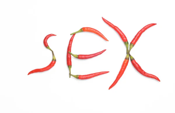 Seks Słowo Wykonane Czerwonej Papryki Chili Izolowane Białym Tle Romantyczna — Zdjęcie stockowe