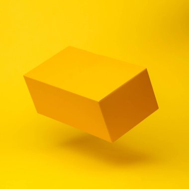Yellow box mockup flying in antigravity on yellow background with shadow. Levitation object in the air. Creative minimal layout
