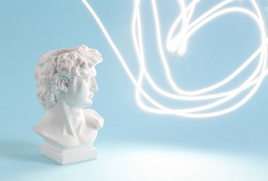 David bust on blue background with light effect