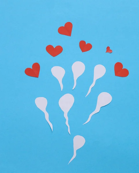 Αγάπη Έννοια Αναπαραγωγής Αρσενικός Σπόρος Σπερματοζωάρια Καρδιές Μπλε Φόντο — Φωτογραφία Αρχείου