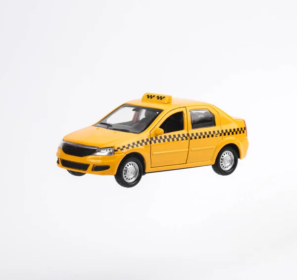 Miniatűr Sárga Taxi Autó Elszigetelt Fehér Háttér — Stock Fotó