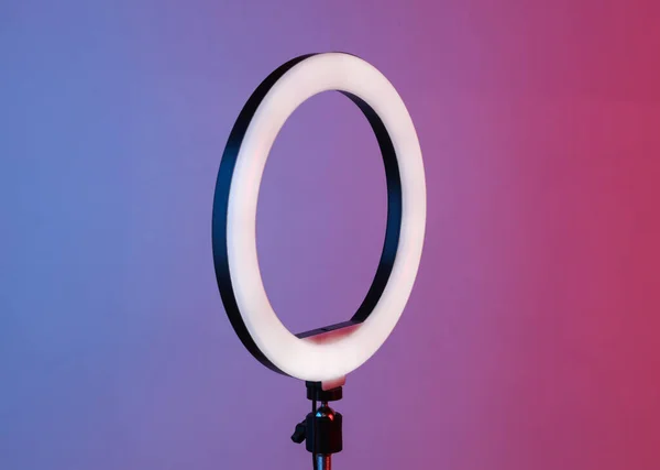 Led ring lamp on tripod, pink blue neon gradient light