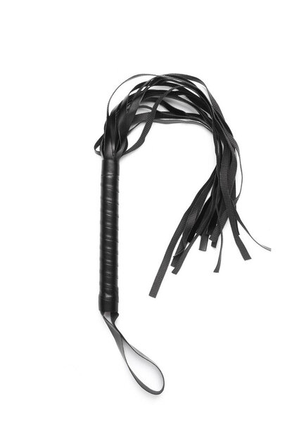 Leather whip from sex shop on white background. Sex games. Top view. Flat lay