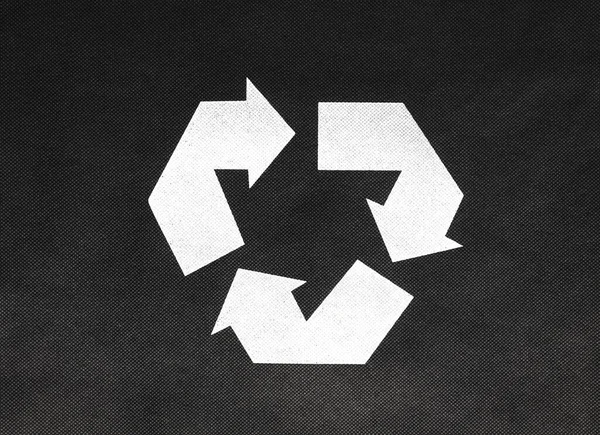 Circular recycling symbol on black background. Eco concept