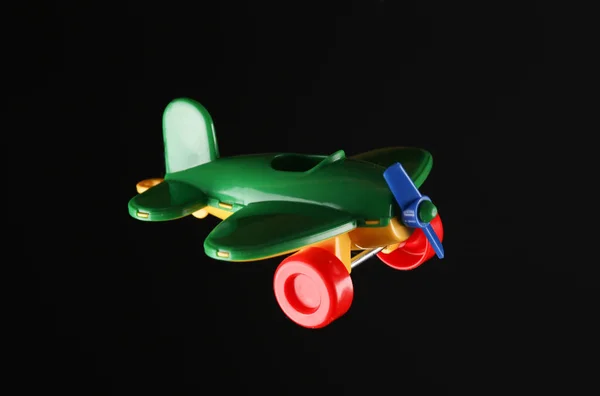 Spielzeugflugzeug Mit Propeller Isoliert Auf Schwarzem Hintergrund — Stockfoto