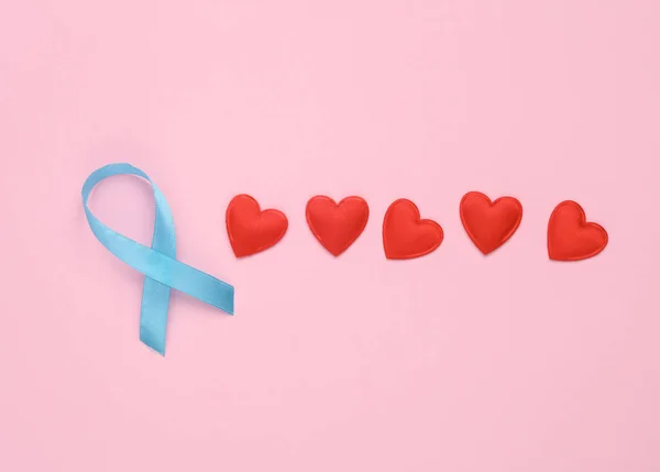 Prostate Cancer Awareness Blue Ribbon Hearts Pink Background — Stock Photo, Image