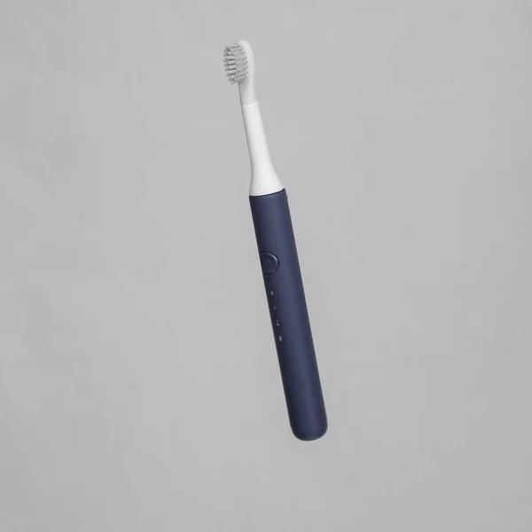 Ультразвуковая Зубная Щетка Сером Фоне — стоковое фото