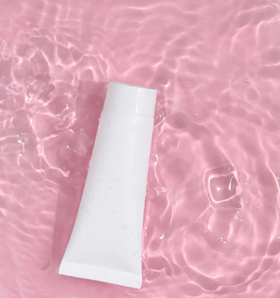 White Cream Tube Pink Water Shadows Beauty Concept Top View — Stock Photo, Image