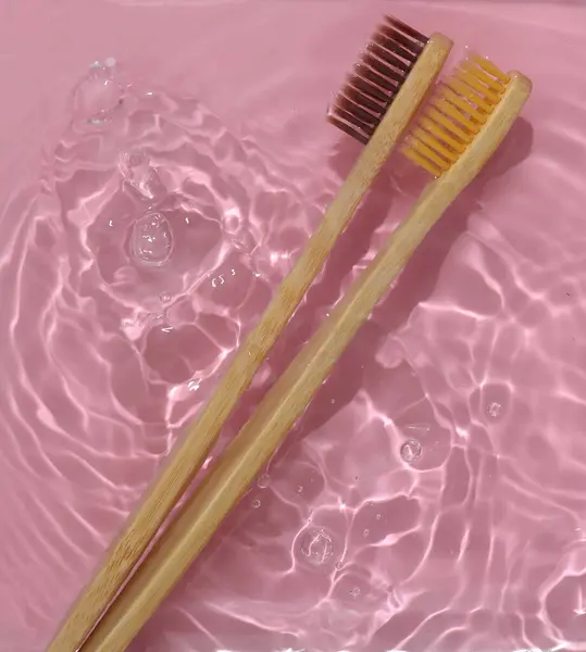 Eco Bamboo Toothbrushes Pink Water Shadows Top View — Stock Photo, Image