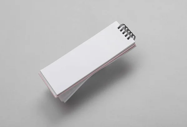 Open Thin Notebook Levitating Gray Background — Stock Photo, Image