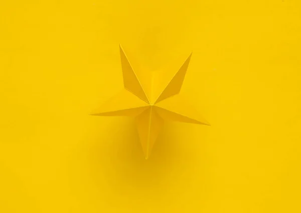 One paper star on yellow background. Service rating