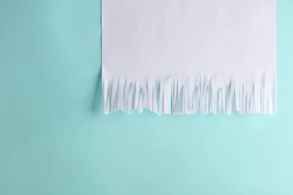 White Cut Shredded Paper Blue Background — Stock Photo, Image