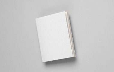 Defter ya da defter modeli, üzerinde beyaz kapaklı gri arka plan. Tasarım şablonu