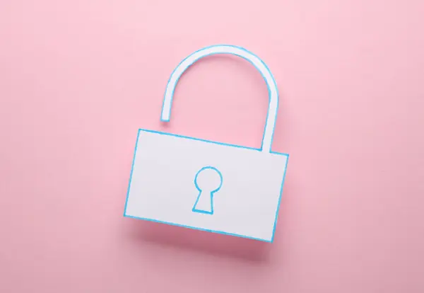 Paper-cut padlock on a pink background