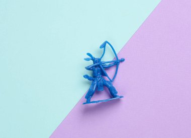 Pastel arka plandaki Amerikan askeri. Vahşi batı, batı. Minimalizm