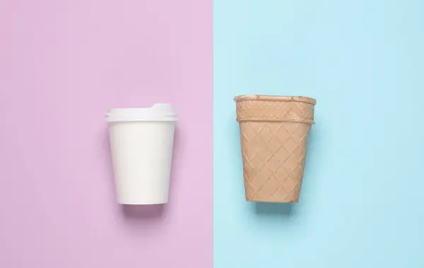 Coffee cup and ice cream cone on pastel background
