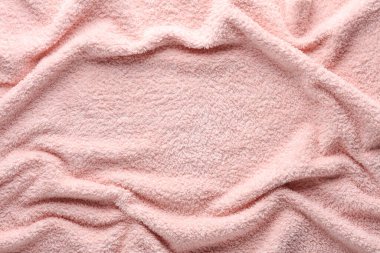 Kopya alanı olan dalgalı pembe tüylü havlunun dokusu