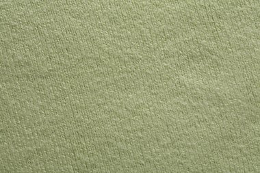 Yeşil yün örülmüş süveter dokusu