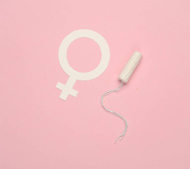 Pembe arka planda kadın cinsiyet sembolü ve tampon.