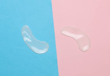 Mavi-pembe arka planda göz bantları. Güzellik konsepti