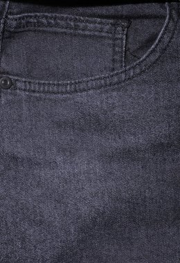 Pantolonun ön cebi. Yakın plan.