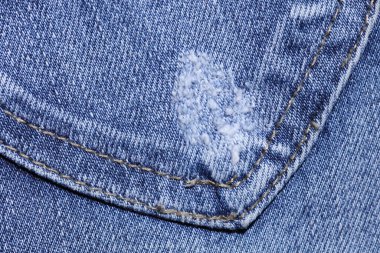 Kot pantolonun dokusu, arka cebi.