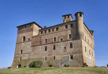 Grinzane Cavour, Italy - February 27, 2019: View of the Grinzane Cavour Castle that stands on the hills of the Langhe
