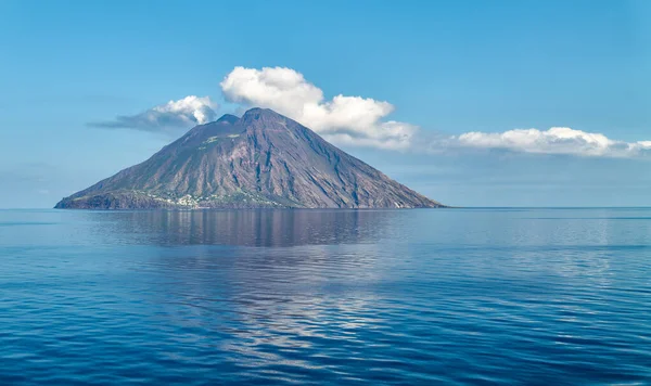 stock image Italy, Sicily, the island of Stromboli with the smoking volcano, seen from the high seas