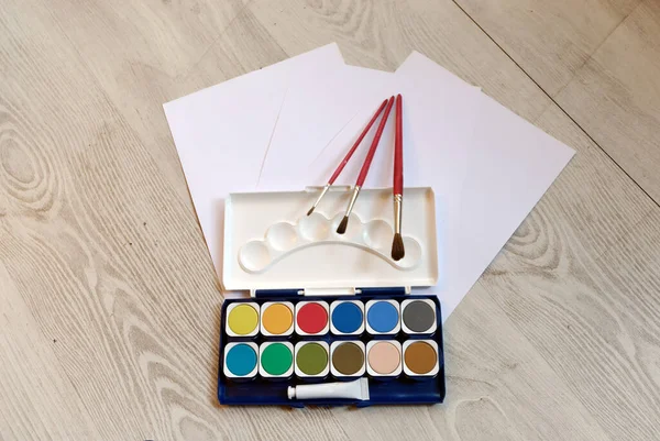 Hobby,Drawing and painting: painting box with watercolors and brushes